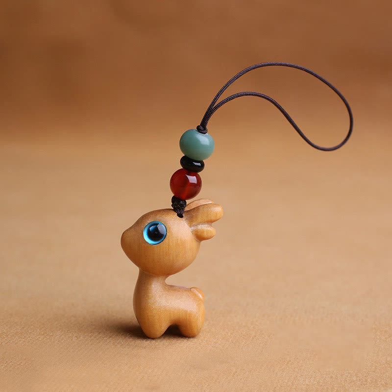 Porte-clés mini-protection contre les cerfs en bois de santal 35 mm