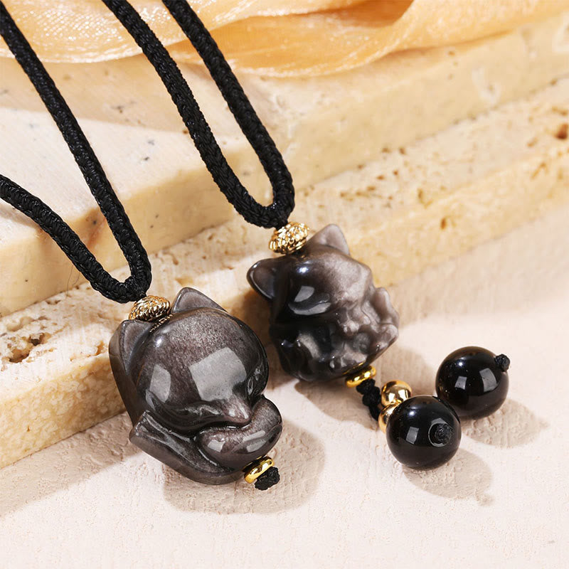 Collier protecteur en obsidienne argentée à neuf queues