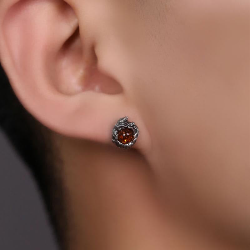 Boucles d'oreilles à tige en argent sterling avec dragon ambré et succès