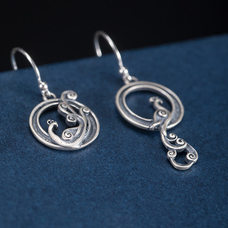 Boucles d'oreilles spirituelles en argent sterling avec motif paon