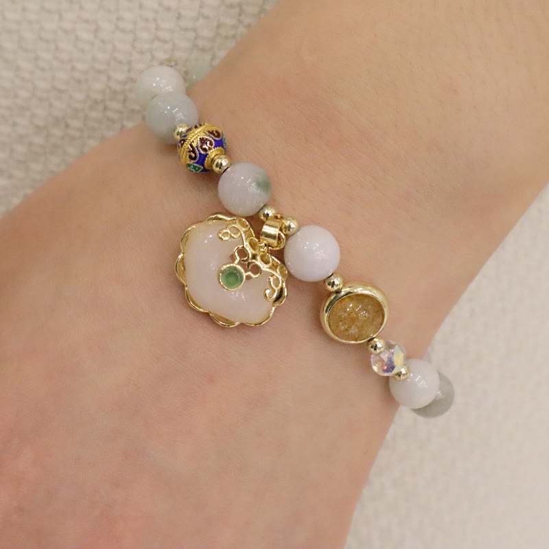 Bracelet de guérison en quartz fraise avec breloque cadenas chinois