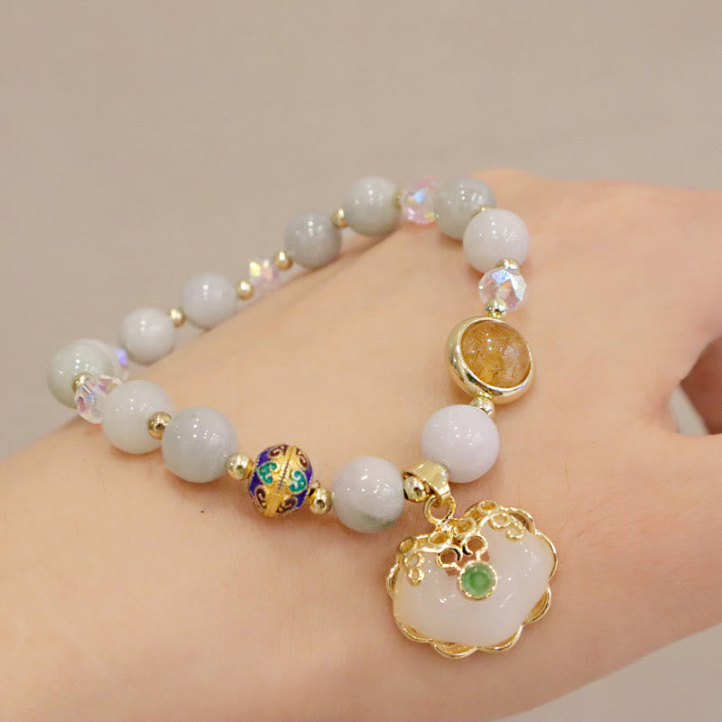 Bracelet de guérison en quartz fraise avec breloque cadenas chinois