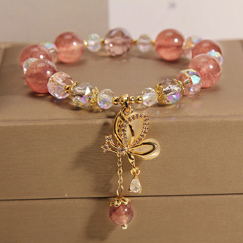 Bracelet à breloques papillon amour et guérison en quartz fraise