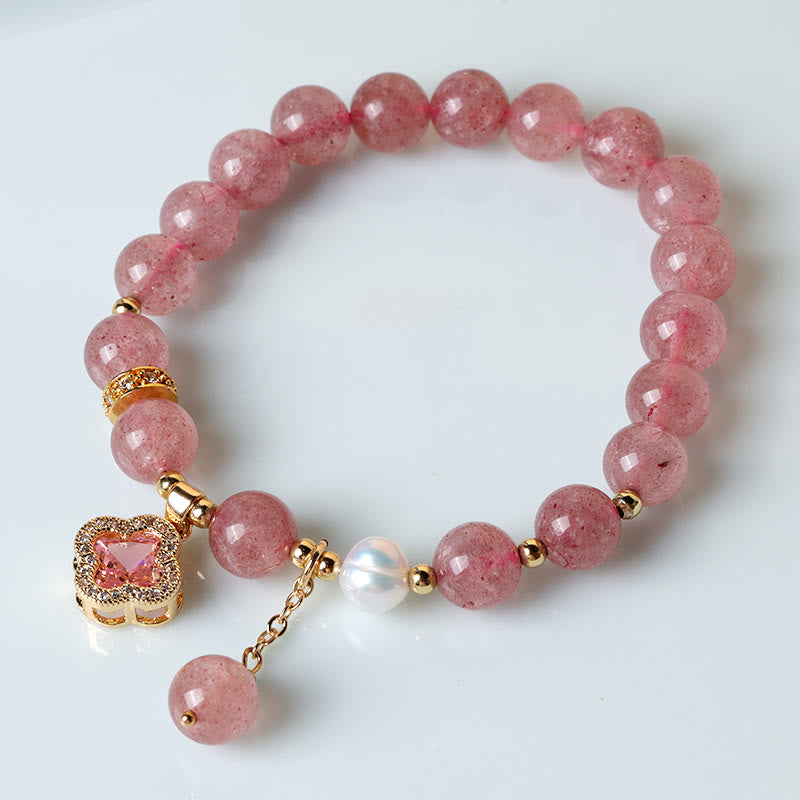Bracelet d'amour en perles de quartz fraise et trèfle à quatre feuilles