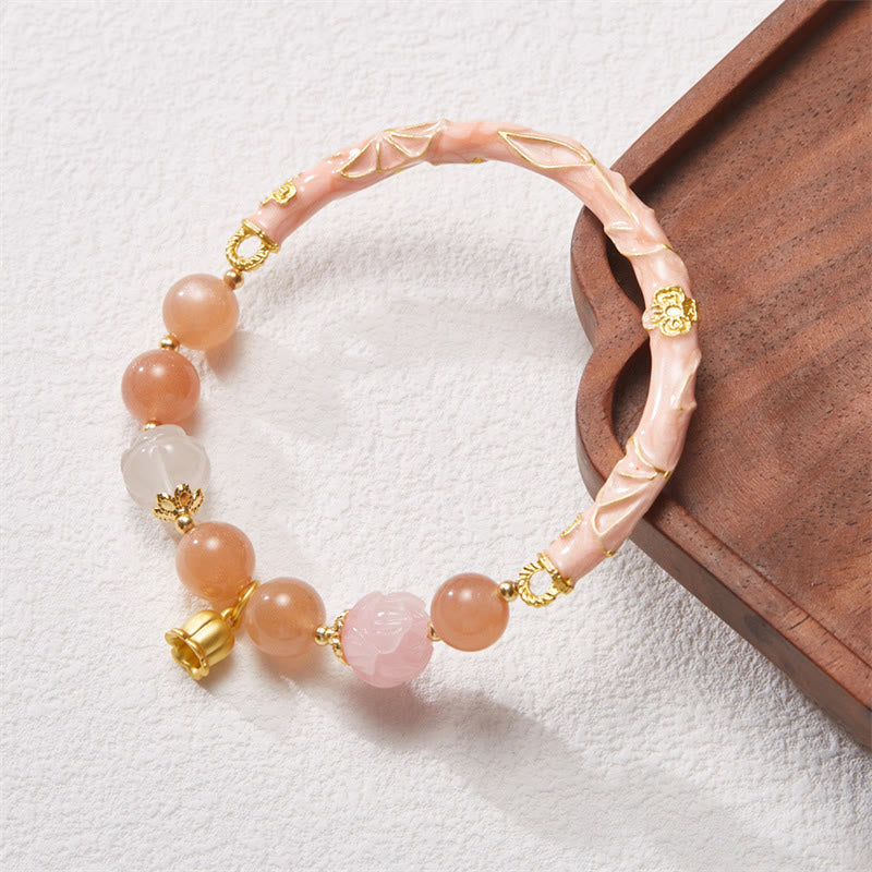 Bracelet à breloques positives en pierre de soleil et jade de soie dorée