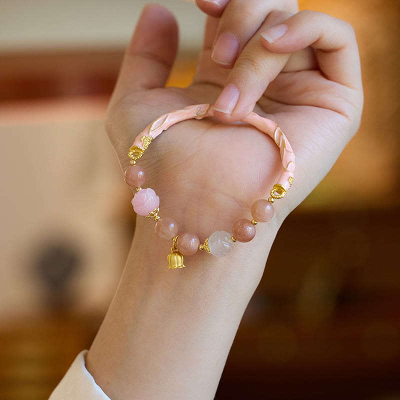 Bracelet à breloques positives en pierre de soleil et jade de soie dorée