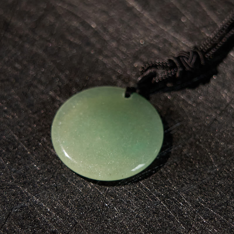 Collier de purification en obsidienne noire à motif de lotus svastika