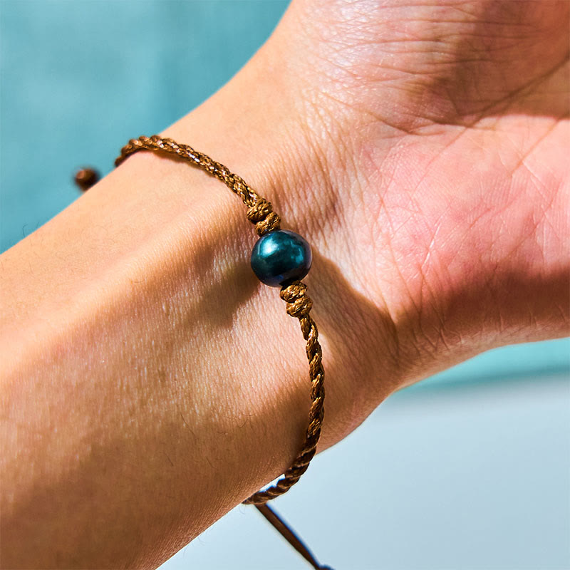 Bracelet Sagesse en perles noires de Tahiti sur corde cirée, 14-19 cm