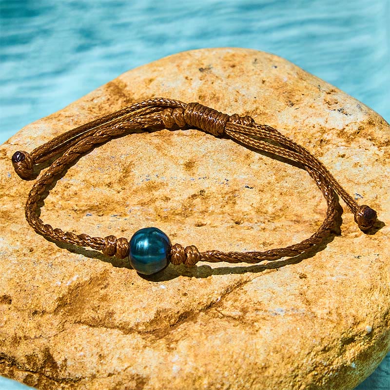 Bracelet Sagesse en perles noires de Tahiti sur corde cirée, 14-19 cm