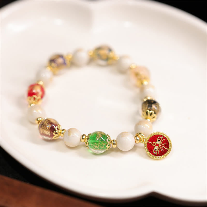 Bracelet tibétain à breloques en verre et porcelaine Liuli pour la richesse