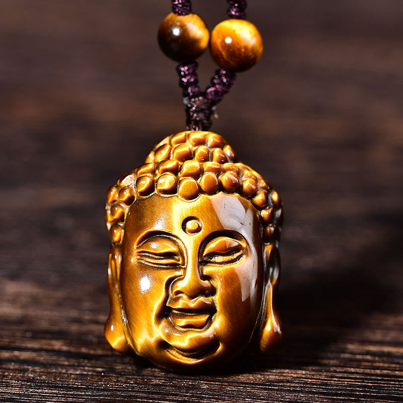 Collier pendentif courage tête de Bouddha œil de tigre