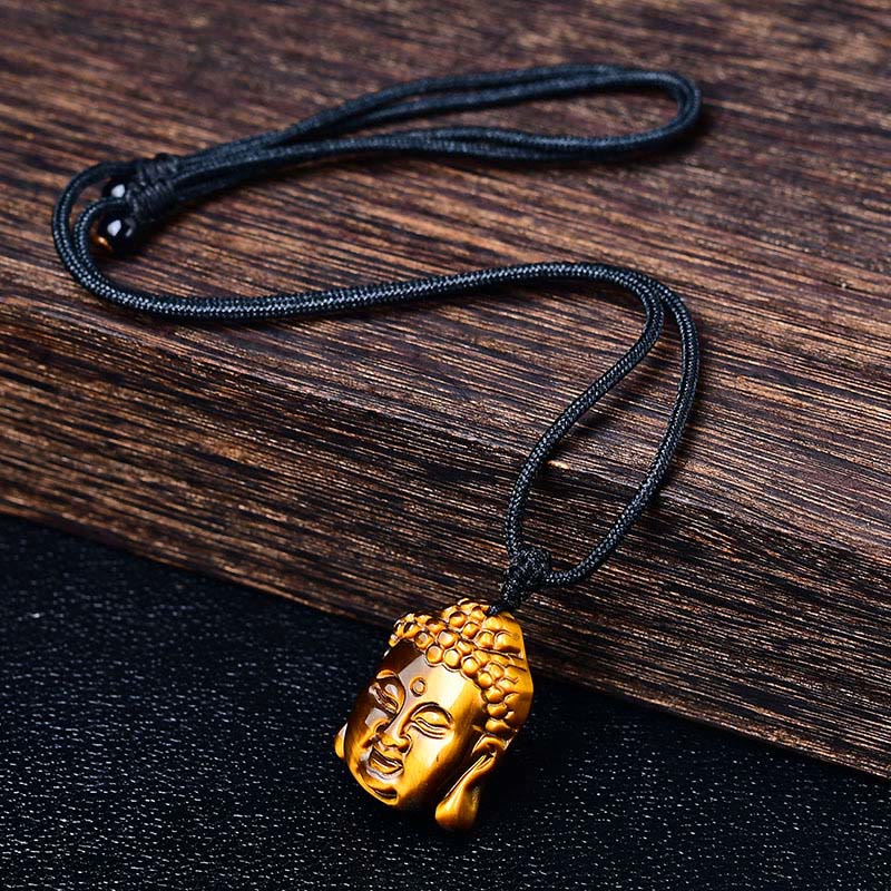 Collier pendentif courage tête de Bouddha œil de tigre