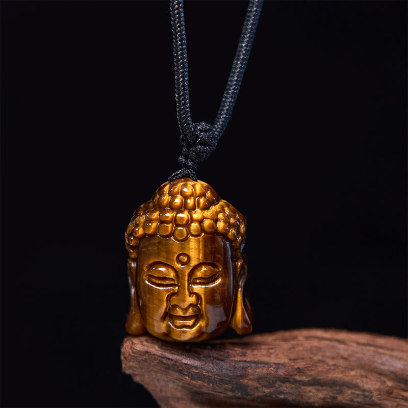 Collier pendentif courage tête de Bouddha œil de tigre