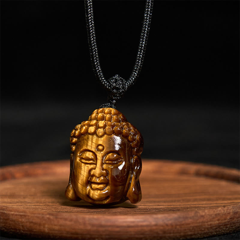 Collier pendentif courage tête de Bouddha œil de tigre
