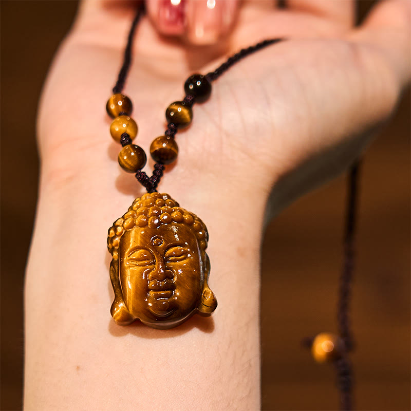 Collier pendentif courage tête de Bouddha œil de tigre