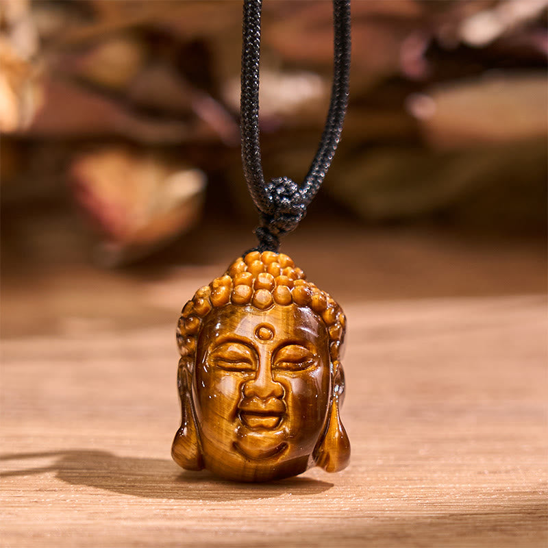 Collier pendentif courage tête de Bouddha œil de tigre