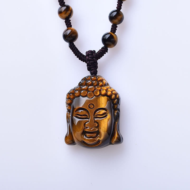 Collier pendentif courage tête de Bouddha œil de tigre