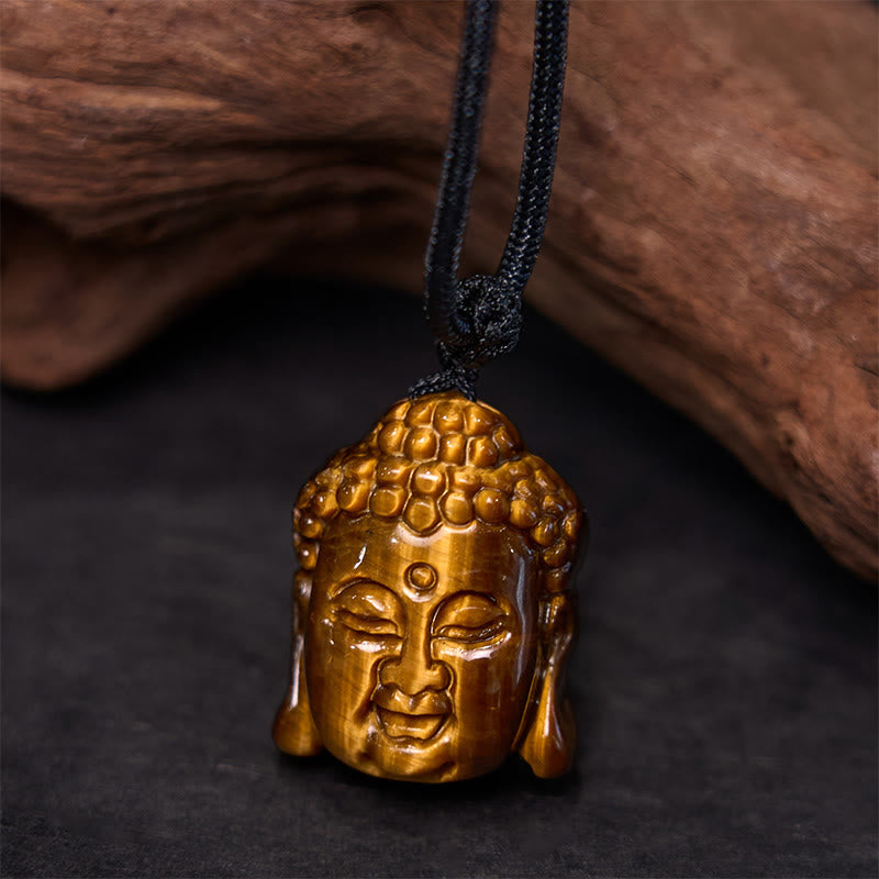 Collier pendentif courage tête de Bouddha œil de tigre
