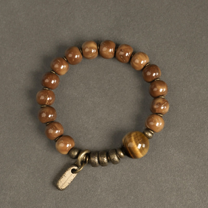 Bracelet de richesse en obsidienne œil de tigre et or brillant Kuka Seed