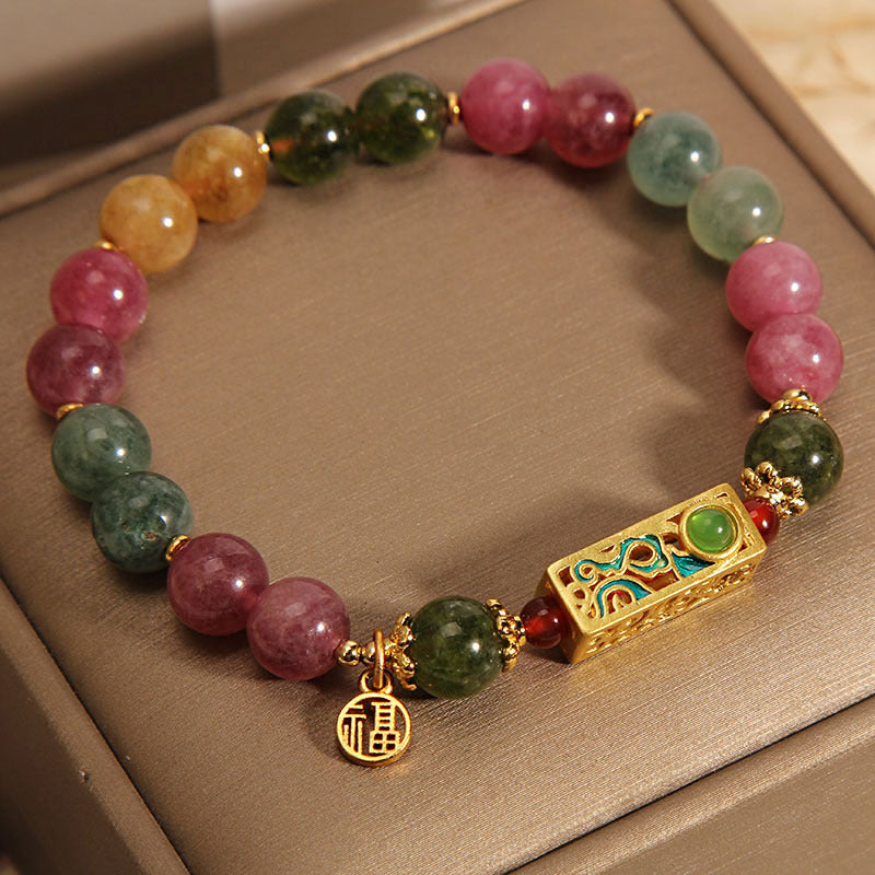 Bracelet en tourmaline avec breloque Fu positive pour le bonheur
