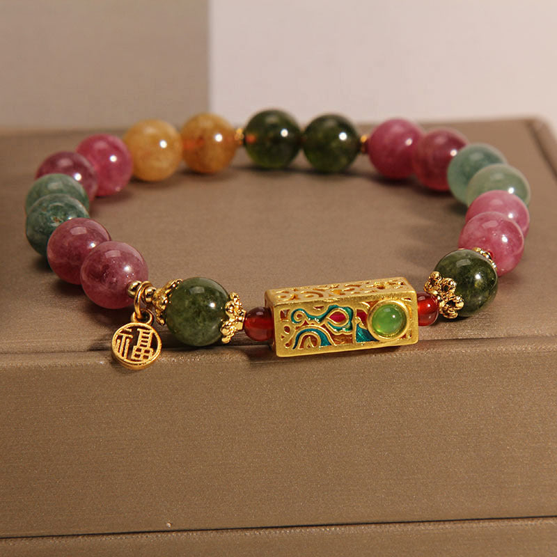 Bracelet en tourmaline avec breloque Fu positive pour le bonheur