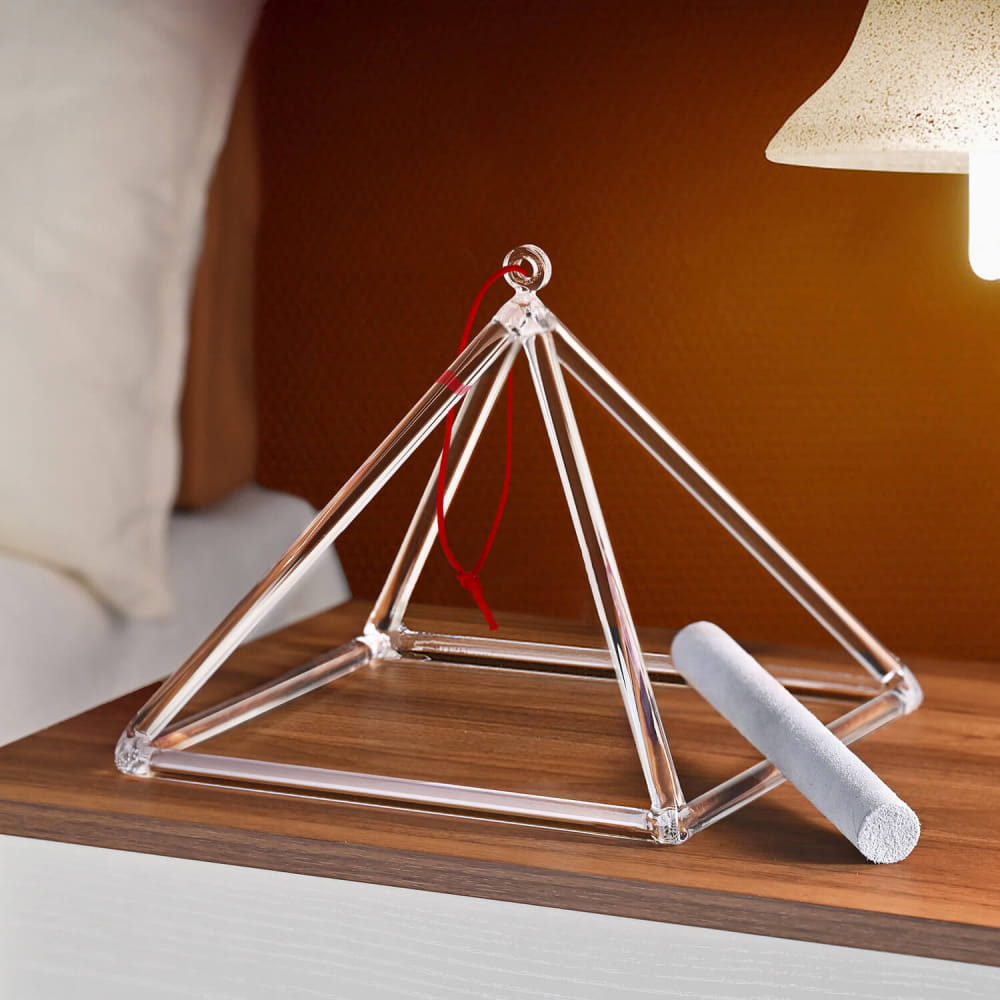 Crystal pyramid-shaped singing bowl with white striker, Triangle Crystal Singing Pyramid
