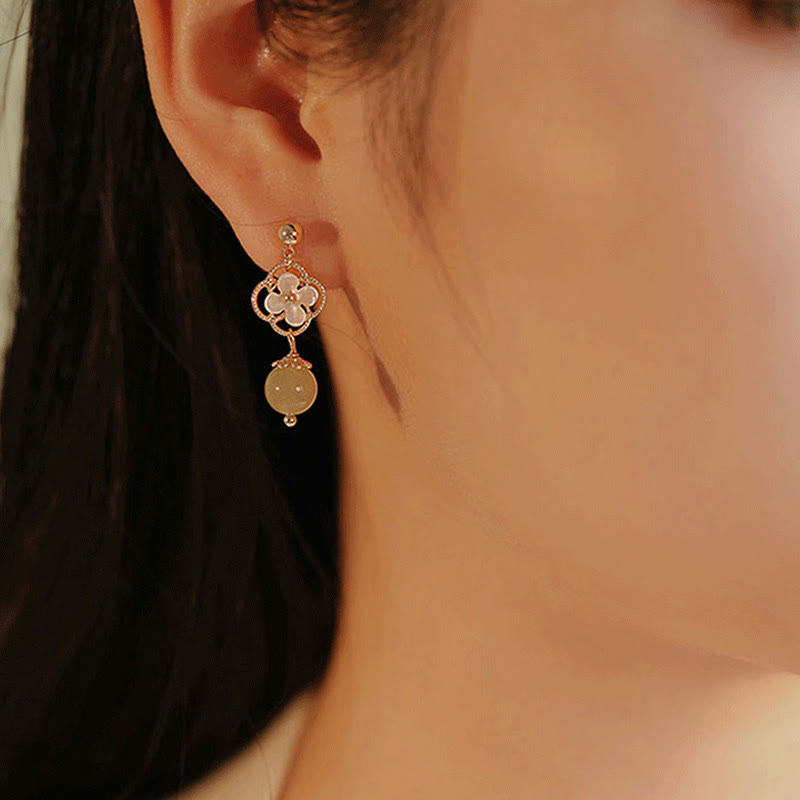 Boucles d'oreilles pendantes en jade Tridacna pour la prospérité et le calme