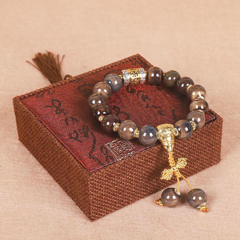 Bracelet de sagesse avec roue de prière turquoise Om Mani Padme Hum