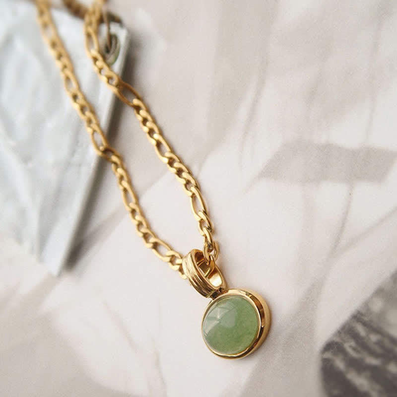 Collier pendentif ovale turquoise en acier titane