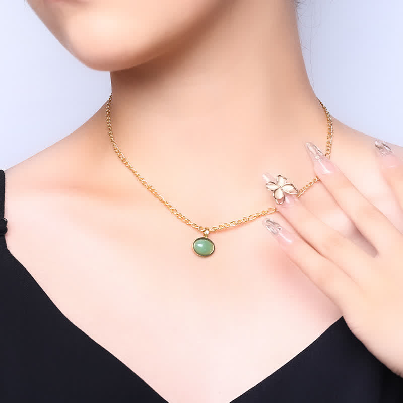 Collier pendentif ovale turquoise en acier titane