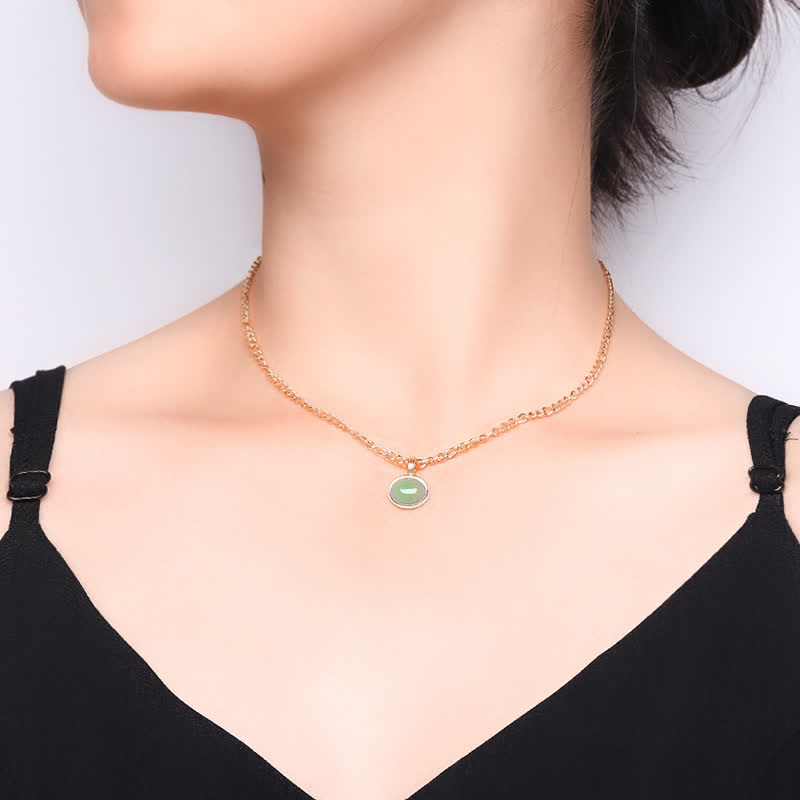 Collier pendentif ovale turquoise en acier titane