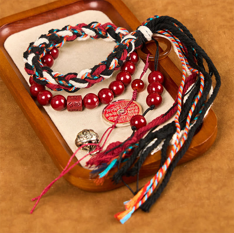 Bracelet unisexe en cinabre avec pompon en corde rouge tibétaine