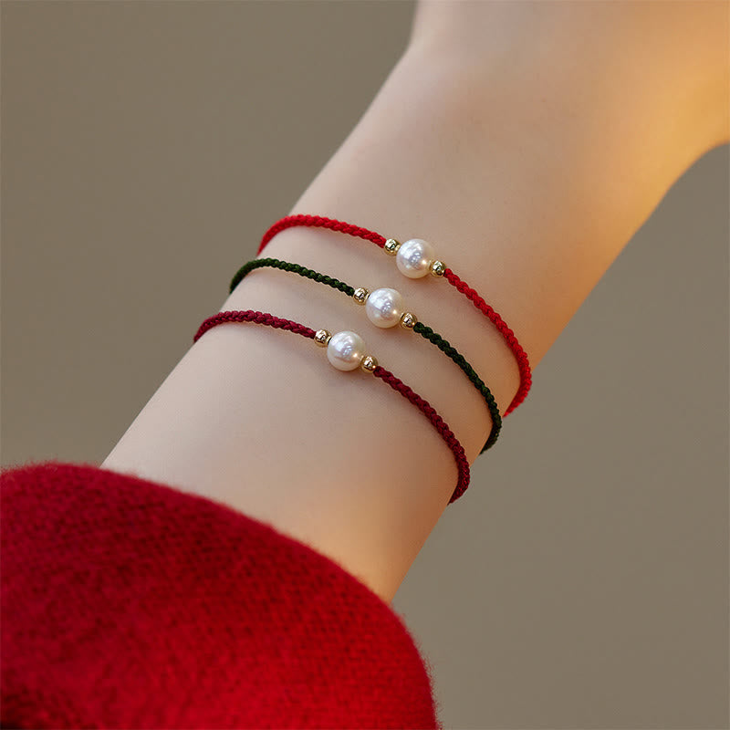 Bracelet porte-bonheur unisexe en perles de 6 mm sur fil rouge