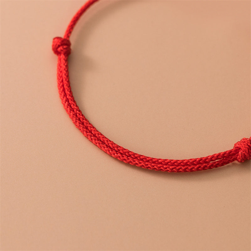 Bracelet unisexe en argent 925 avec fil rouge et trèfle à quatre feuilles