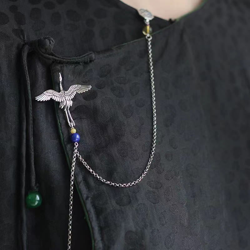 Broche grue vintage en cuivre pour le bonheur et la transformation