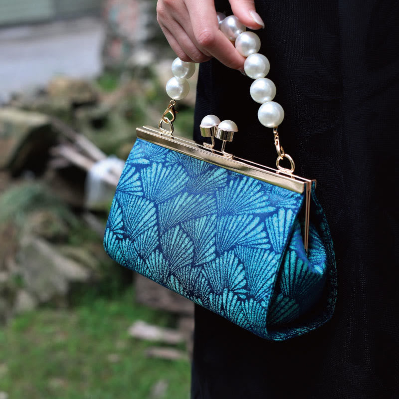 Sac à main vintage en métal nacré à motif de feuilles bleu paon