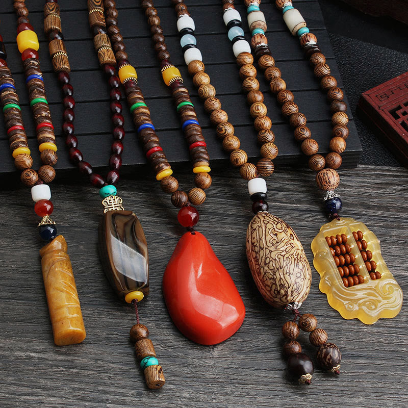 Collier d'équilibre en bois de wengé et agate pour la paix et la protection