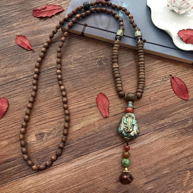 Collier éléphant en bois de wengé avec perle dzi | Protection