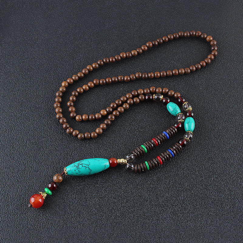 Collier en bois de wengé turquoise pour la protection et le calme 80 cm