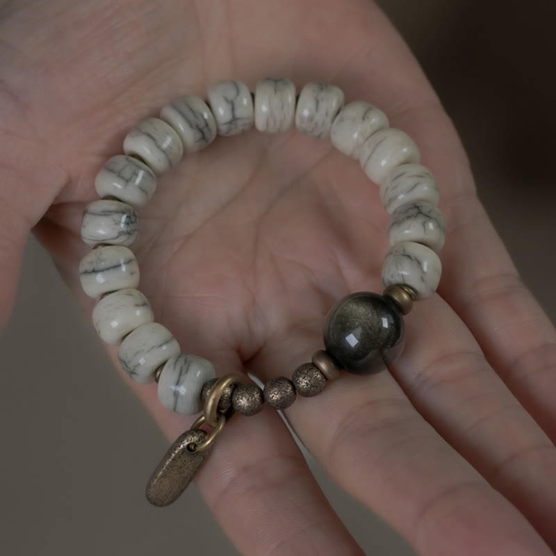 Bracelet unisexe en obsidienne dorée et os de yak