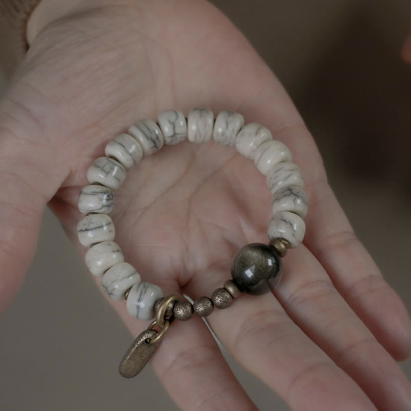 Bracelet unisexe en obsidienne dorée et os de yak