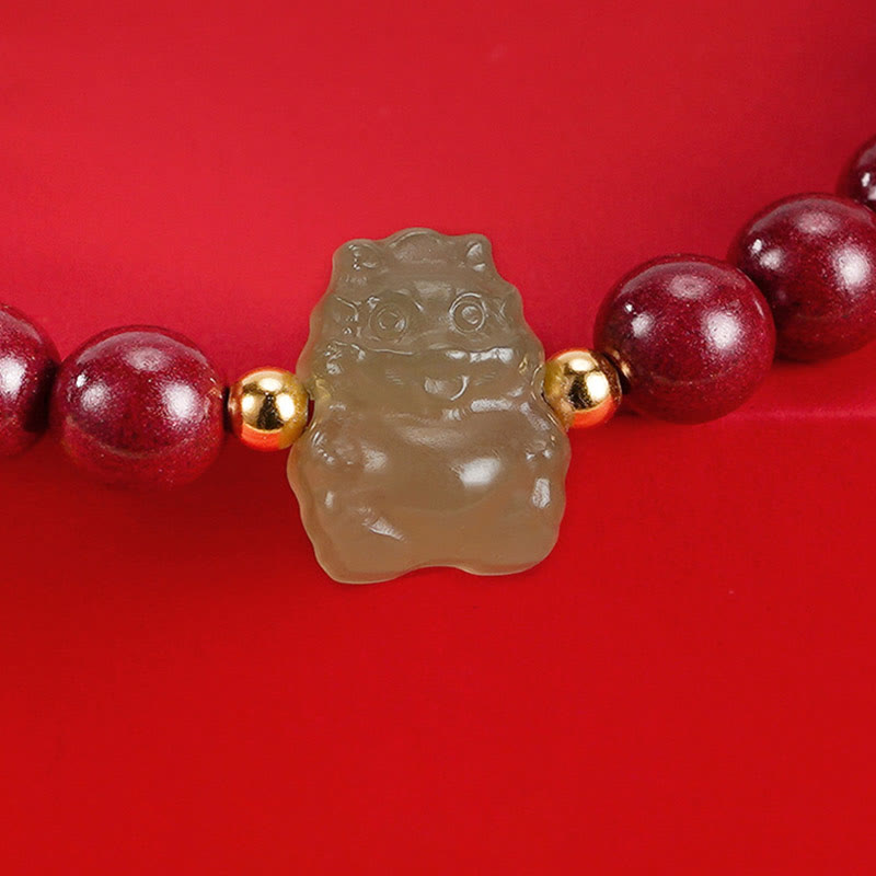 Sterling Silver Dragon Bracelet with Cinnabar & Jade Charms