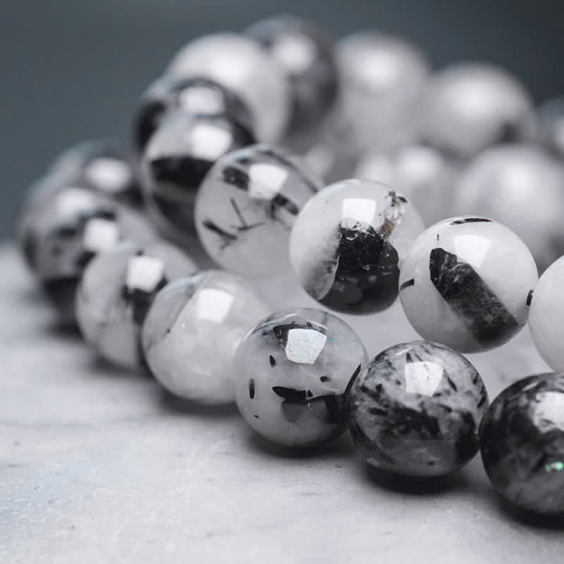 Bracelet couple en quartz rutile noir et quartz clair 8 mm