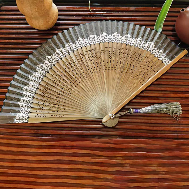 22cm Bamboo Folding Fan with Hollow Engraved Design | Tranquil Comfort