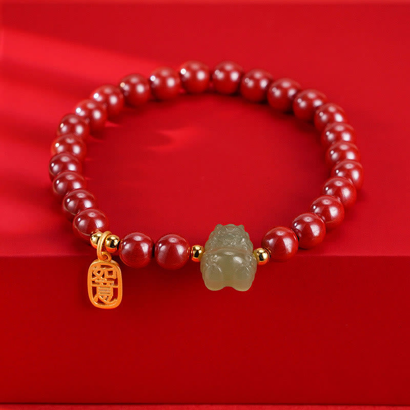Sterling Silver Dragon Bracelet with Cinnabar & Jade Charms