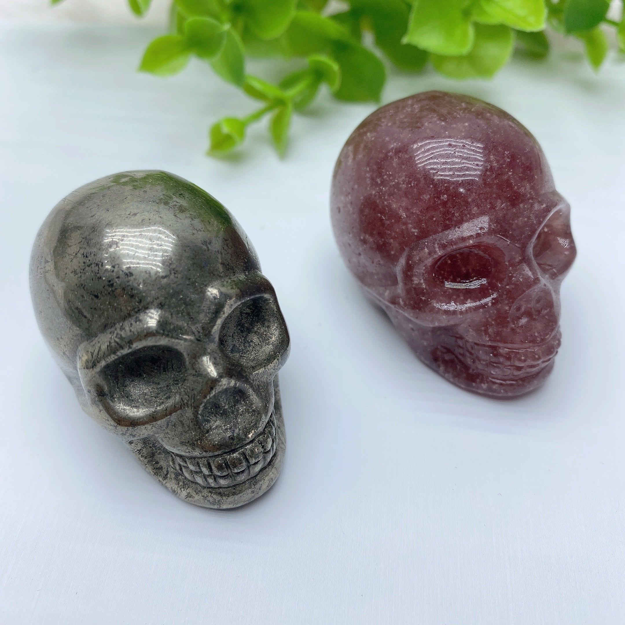 1.85 inch Pyrite & Strawberry Quartz Crystal Skull Carvings