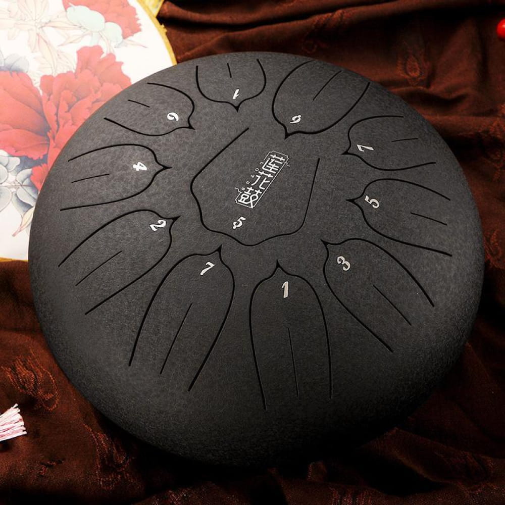 Black steel tongue drum with numbered tones, part of 10 Carbon Steel Tongue Drum