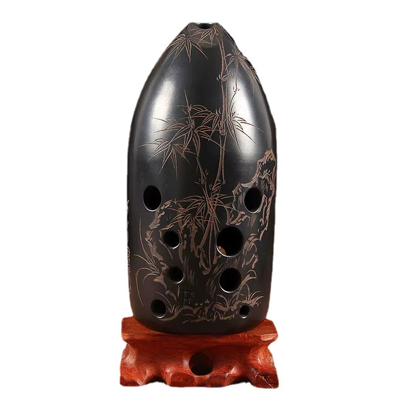 Black ceramic ocarina with bamboo designs on wooden stand, 10-Hole Ceramic Xun F Key