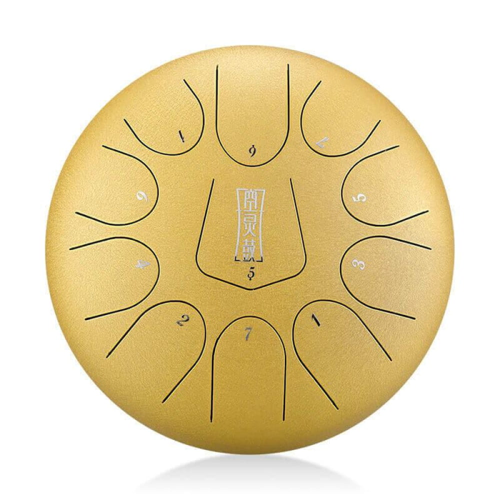 Golden steel tongue drum with 11 tones in circular pattern for musical harmony