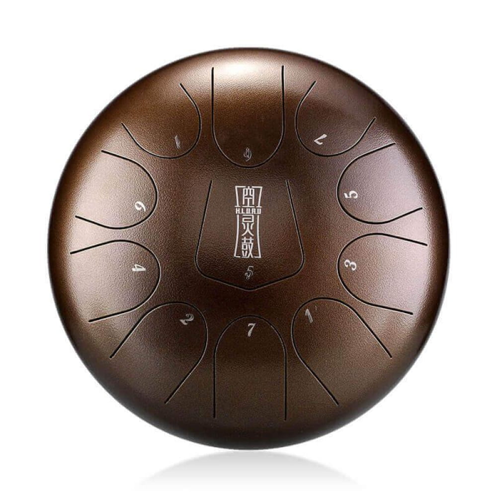 Bronze-colored Steel Tongue Drum with etched tone markers and central logo design